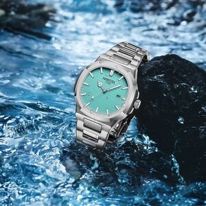 The Nautilus In Stainless Steel With A Cyan Dial